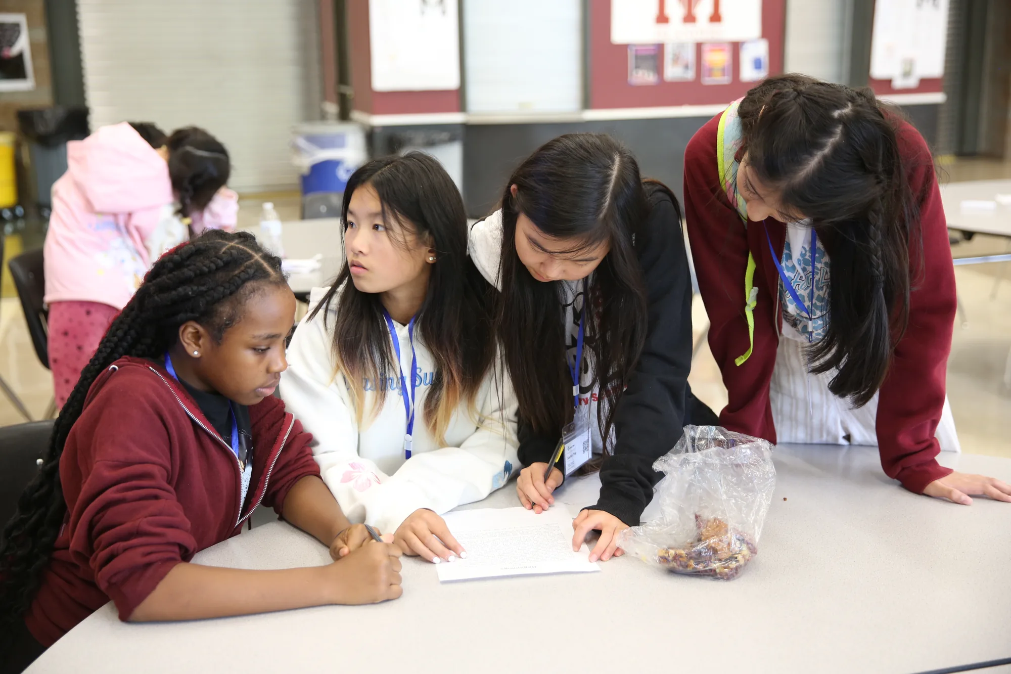Competitors working on puzzle round